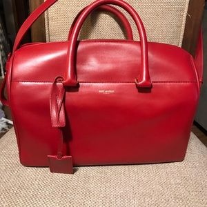 Red saint Laurent small duffel style bag